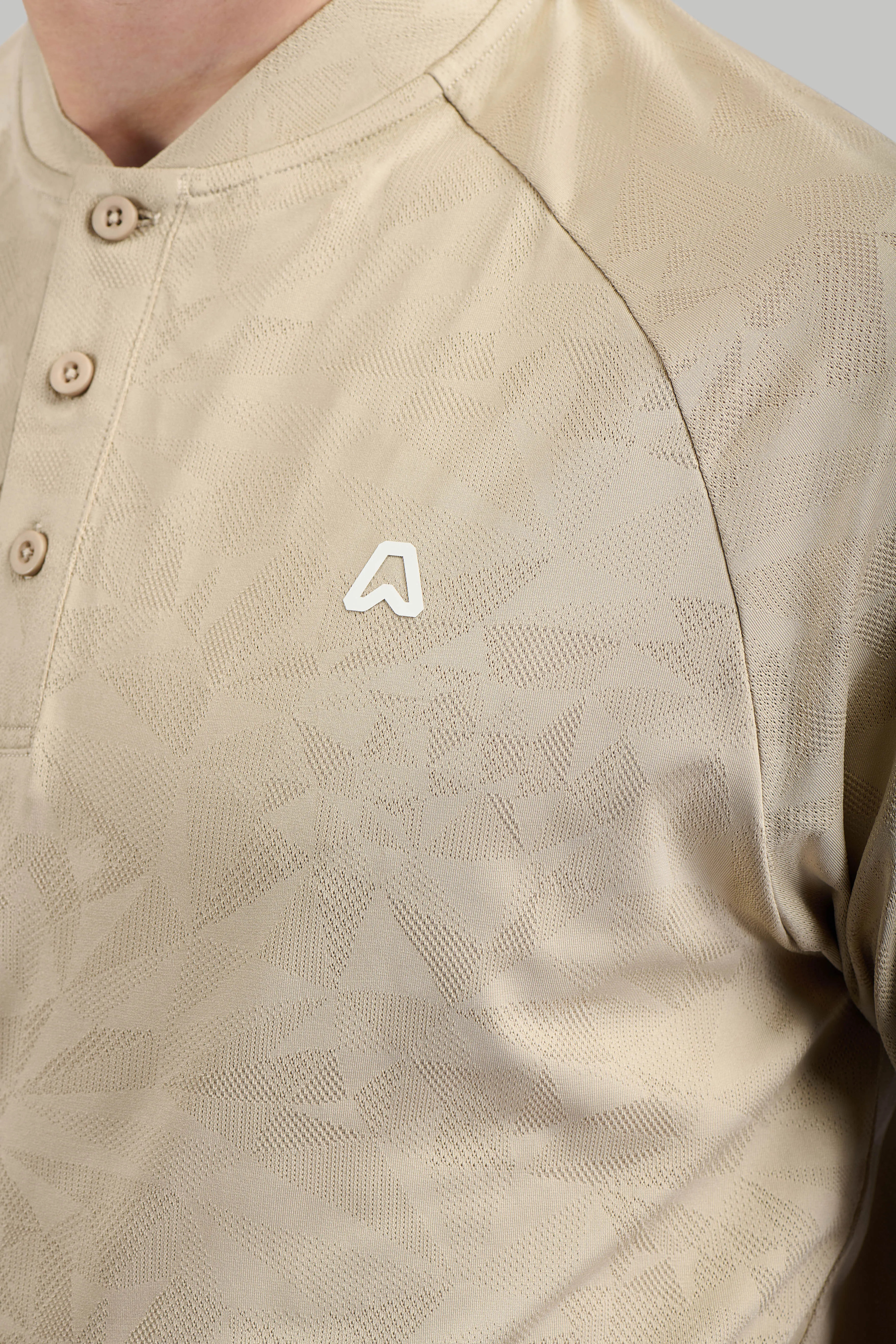 Orbit Texture Grandad Golf Polo Shirt - Bunker Sand Minimalist Look